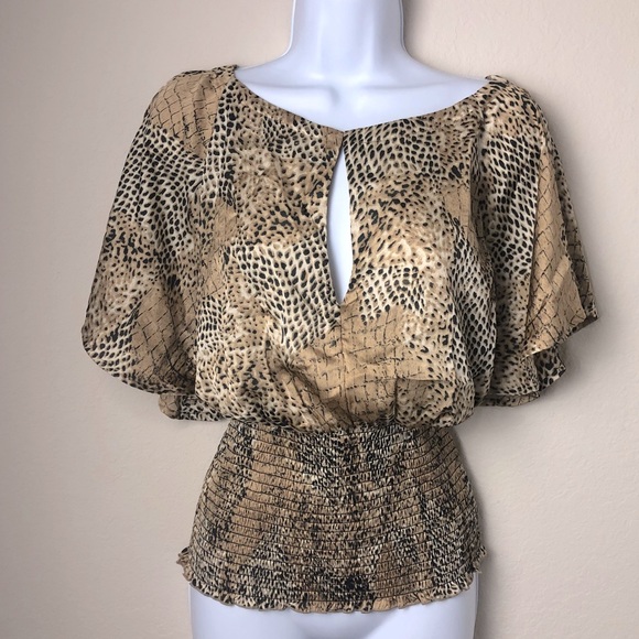 bebe Tops - 2b Bebe cheetah/leopard print top